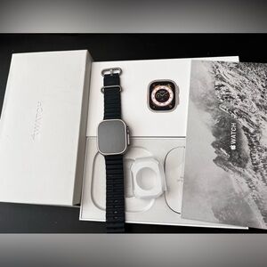 Sold. Apple Ultra Titanium GPS+Cellular. Comes with ocean navy blue band.